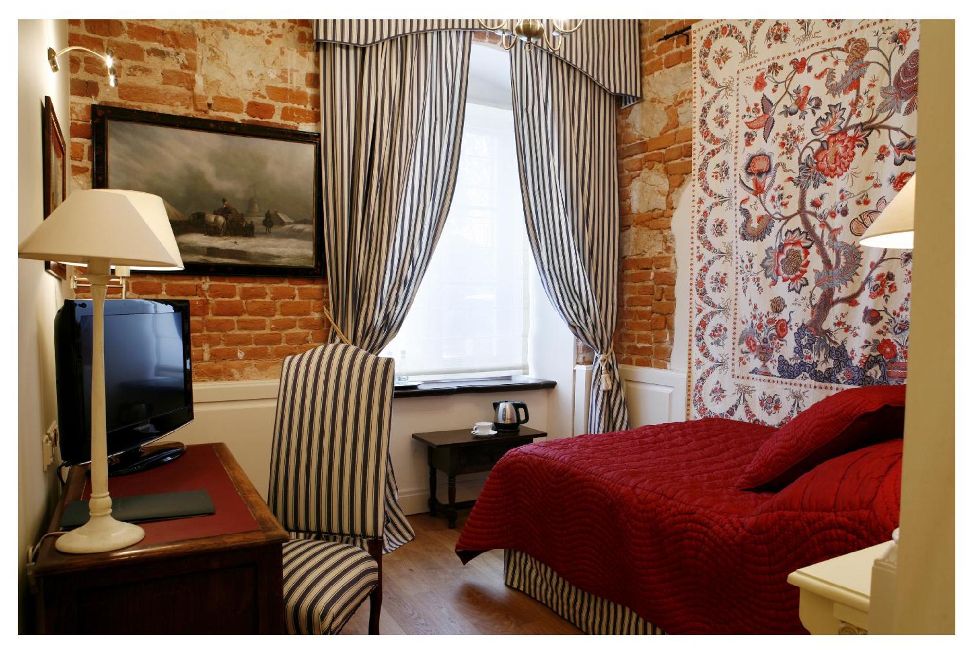 Hotel Dwor Kosciuszko Cracovie Extérieur photo A room at the hotel